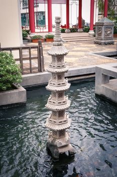 Chinese pillar in the pool