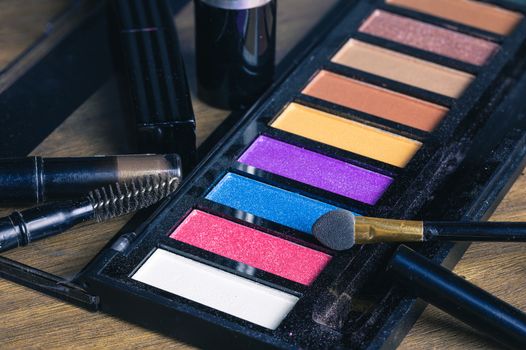 Closeup colorful makeup products and cosmetics detail object art