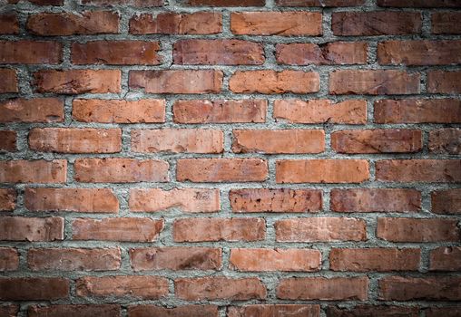 Orange old worn brick wall texture background. Vintage effect.