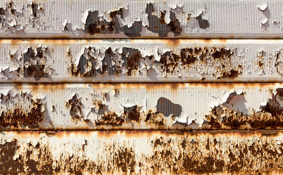 Rusty garage door. Vintage style. Ideal for backgrounds.