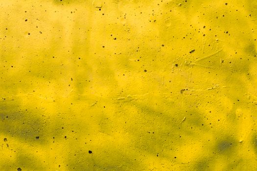 Abstract yellow background texture concrete wall.