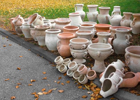 Exhibition and sale of clay pots in a park.