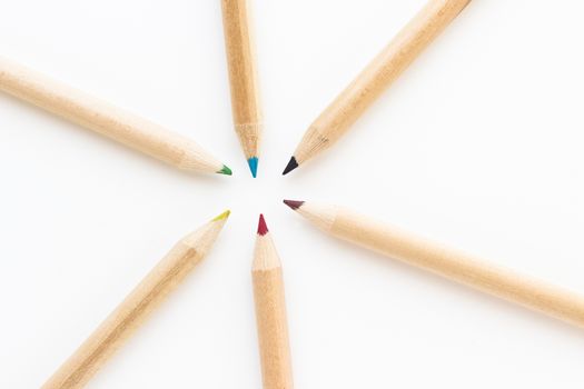 Group of crayons on white background and seen from above.