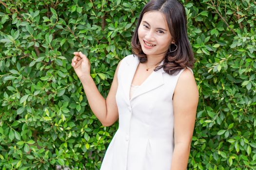 Woman happy feeling with green nature background