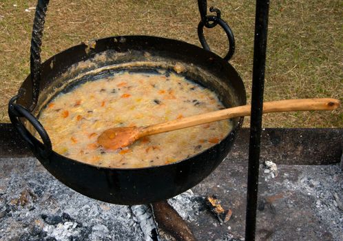 Pottage cooking on a wood fire
