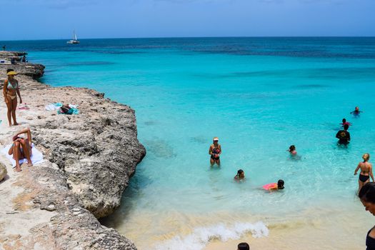 Arikok Natural Park on the island of Aruba in the Caribbean Sea with deserts and ocean waves on the rocky coast