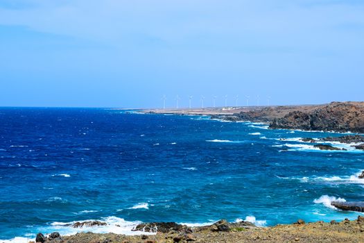 Arikok Natural Park on the island of Aruba in the Caribbean Sea with deserts and ocean waves on the rocky coast