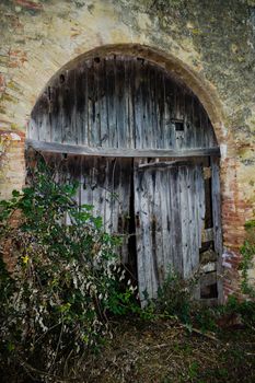 Old building in a sunny spring day with blue sky in Peccioli countryside, Valdera, Tuscany. Italy