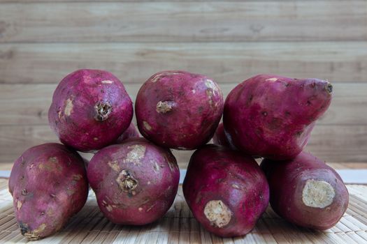Raw sweet potatos freshly harvested from the farm.