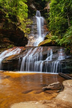 Water cascading over rocks early in the morning in Leura Cascades, New South Wales, Australia