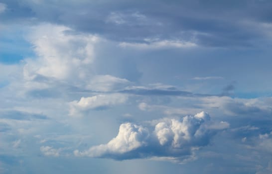 Blue sky with large cloud background.