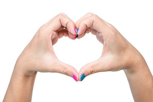 Close-up of a woman's hand showing heart sign with a pink and blue nail polish isolated on a white background.