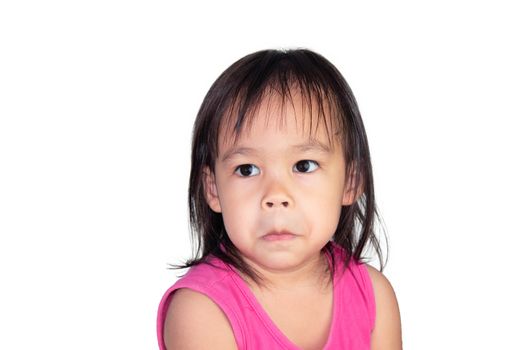 Adorable Asian child thinking and wearing pink dress isolated on a white background.