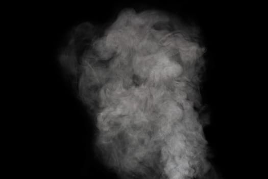 White smoke on dark background.