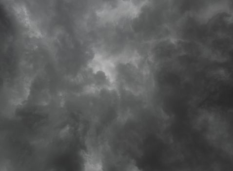 The dark clouds on dramatic sky background before the rainy weather.