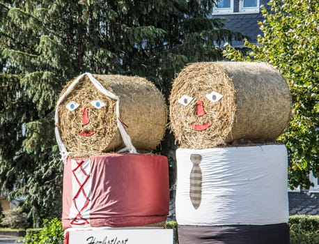 Bales of straw decorated as dolls