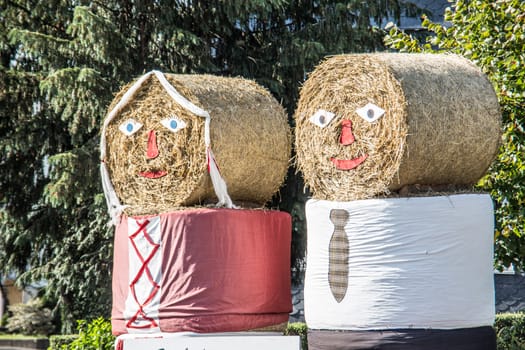 Bales of straw decorated as dolls