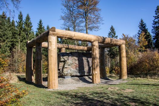 Huge boulder in the forest as an art event