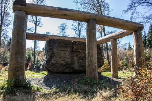 Huge boulder in the forest as an art event