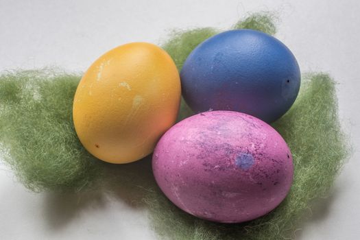 colorful easter eggs in the nest
