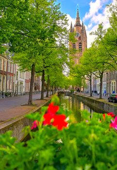 The canals and waterways in the city of Delft in The Netherlands on a sunny day.