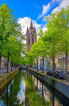 The canals and waterways in the city of Delft in The Netherlands on a sunny day.