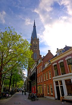 Architecture along the streets in the city of Delft in the Netherlands on a sunny day.