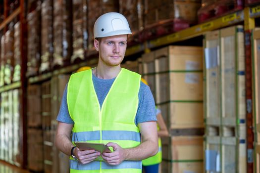 Technician works in merchandise trade in logistics,Warehouse workers.