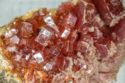 reddish vanadite crystals on bedrock