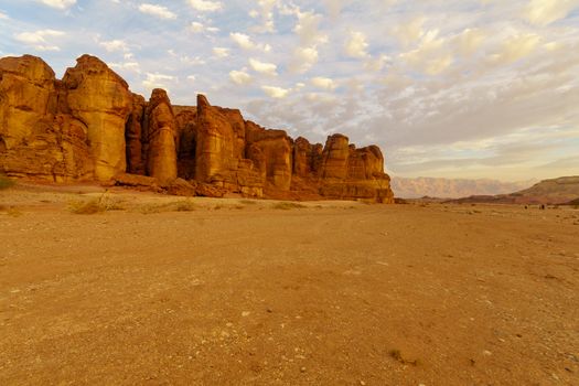 Sunset view of landscape and the Solomon Pillars rock formation, in the Timna Valley, Arava desert, southern Israel