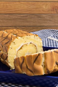 Freshly made vanilla roll cake for tea break.