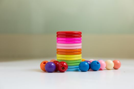 These colorful buttons and beads are for kids to practice their sewing skill.