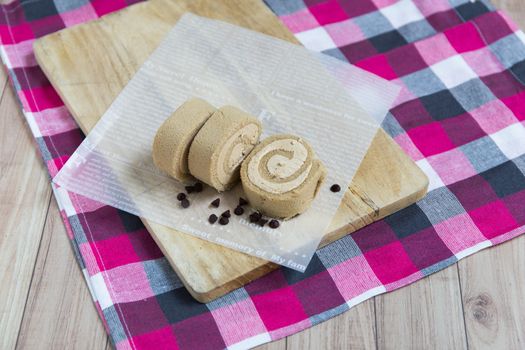 Freshly made slices of roll cake.