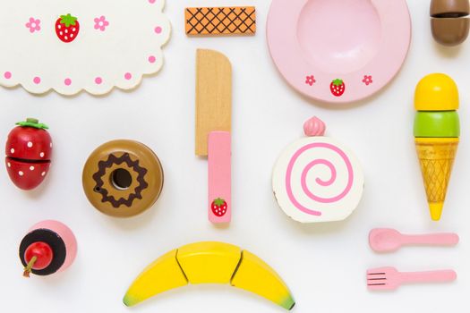 Fake food and kitchen equipment for little children.