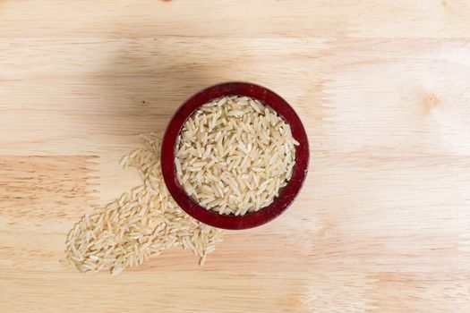 Uncooked Jasmine Brown Rice in Mortar