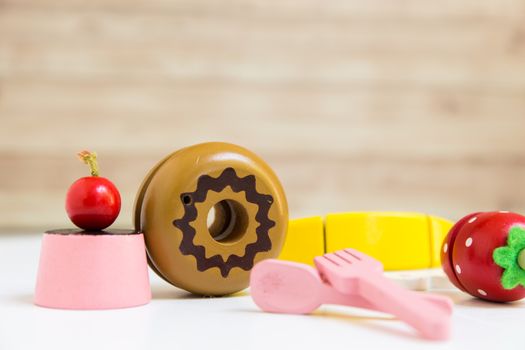 Fake food and kitchen equipment for little children.