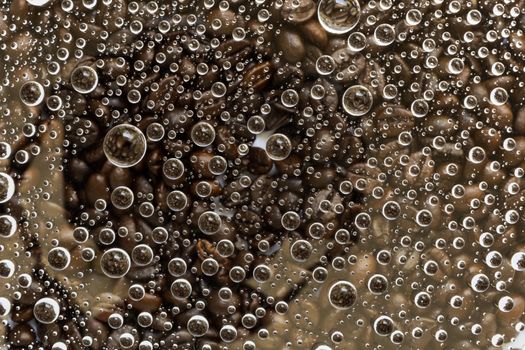 Water drop, droplet, raindrop of coffee bean background