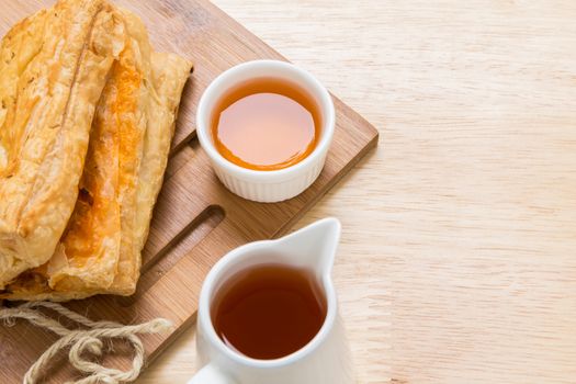 Freshly made puff pastry pie for tea break.