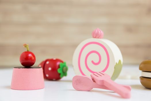Fake food and kitchen equipment for little children.