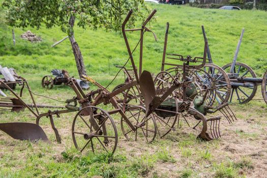 Historic agricultural machinery on the field