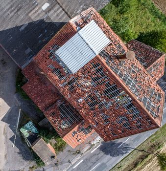 Aerial view of an old house, lost place, ruin, near Hildesheim, Germany, top view