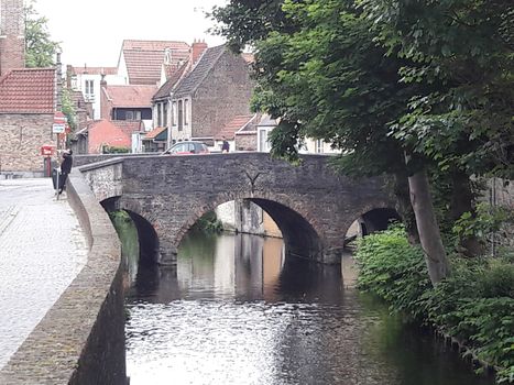 Classic view of the historic city center of Bruges (Brugge), West Flanders province, Belgium. Cityscape of Bruges. Architecture and landmark of Bruges