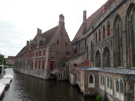 Classic view of the historic city center of Bruges (Brugge), West Flanders province, Belgium. Cityscape of Bruges. Architecture and landmark of Bruges