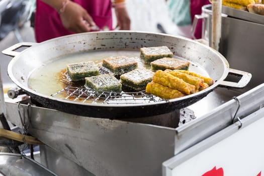 Hawker Selling Street Food in Thailand