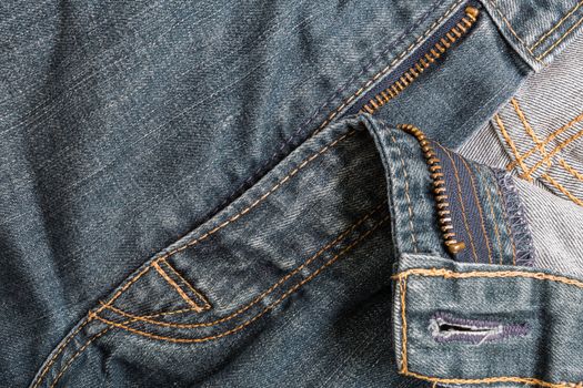 Old blue jeans background