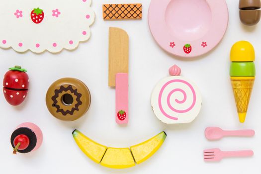 Fake food and kitchen equipment for little children.