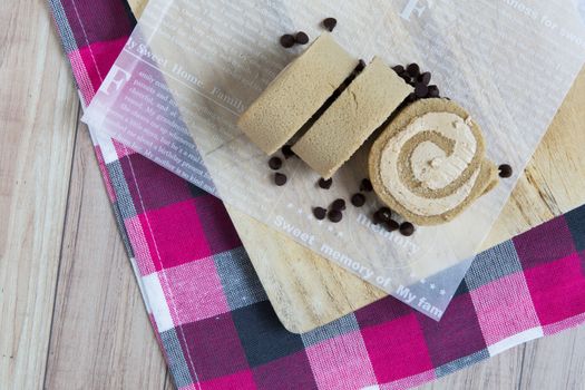 Freshly made slices of roll cake.
