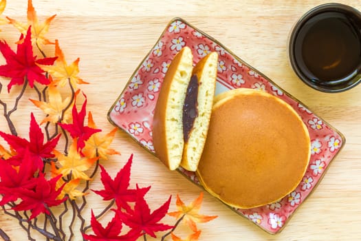 Dorayaki or Japanese pancake filled with red bean paste.
