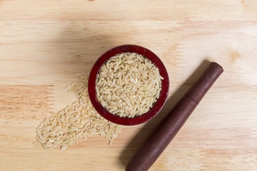 Uncooked Jasmine Brown Rice in Mortar