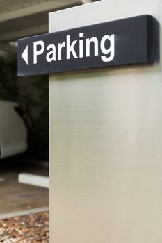 Parking sign guiding visitors to find their parking space.